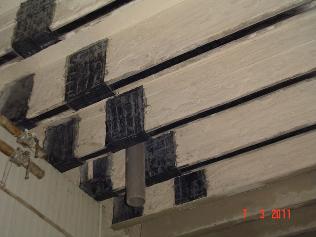 Carbon Fibre Reinforced Polymers for Strengthening of Structural Elements