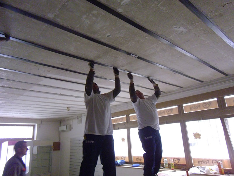 Carbon Fibre Reinforced Polymers for Strengthening of Structural Elements